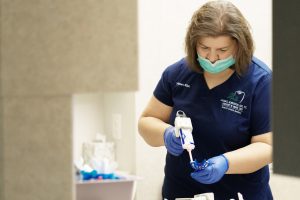 Dental Assistant helping during a patient visit